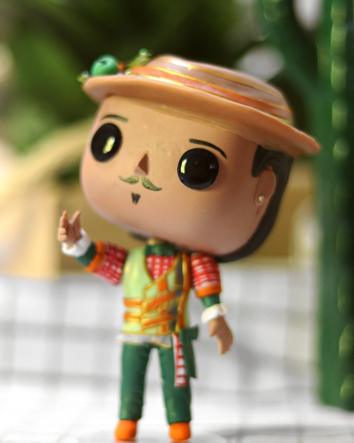 Personagem fazendeiro em biscuit